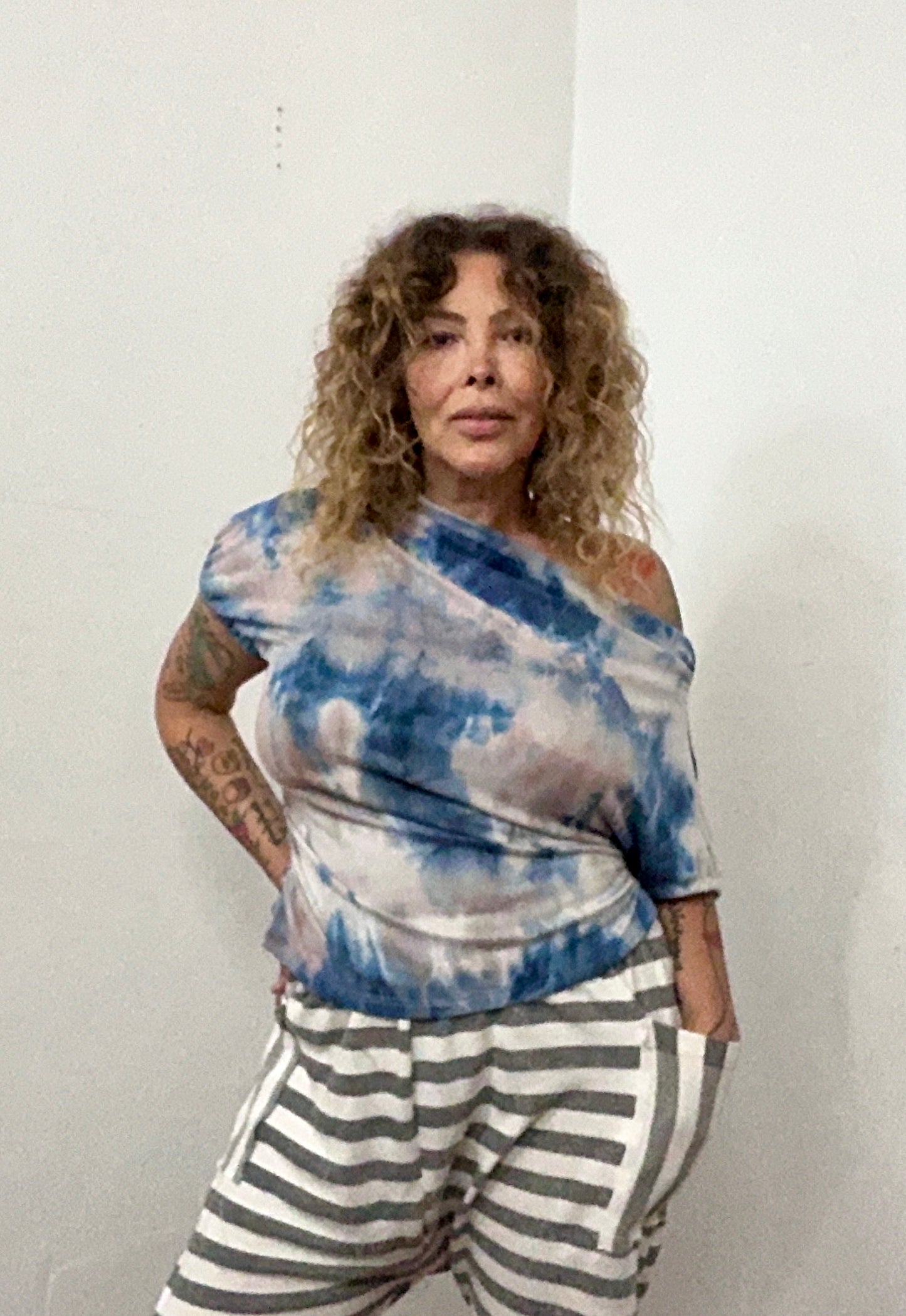 Off shoulder asymmetrical sweater top