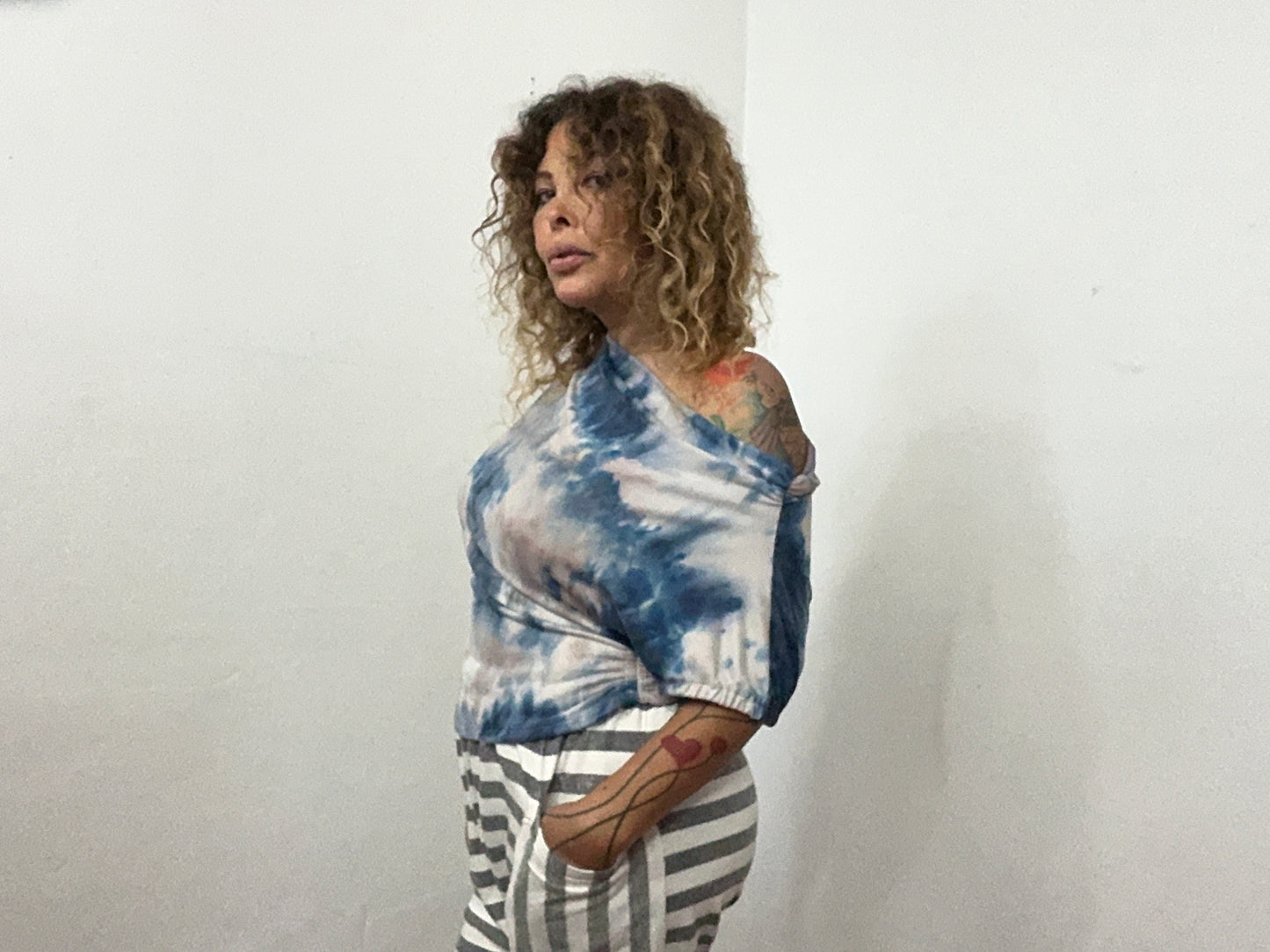 Off shoulder asymmetrical sweater top