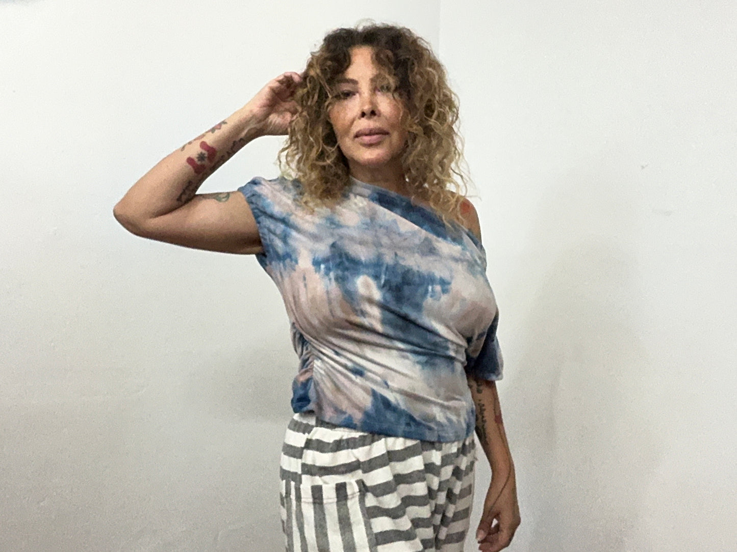 Off shoulder asymmetrical sweater top