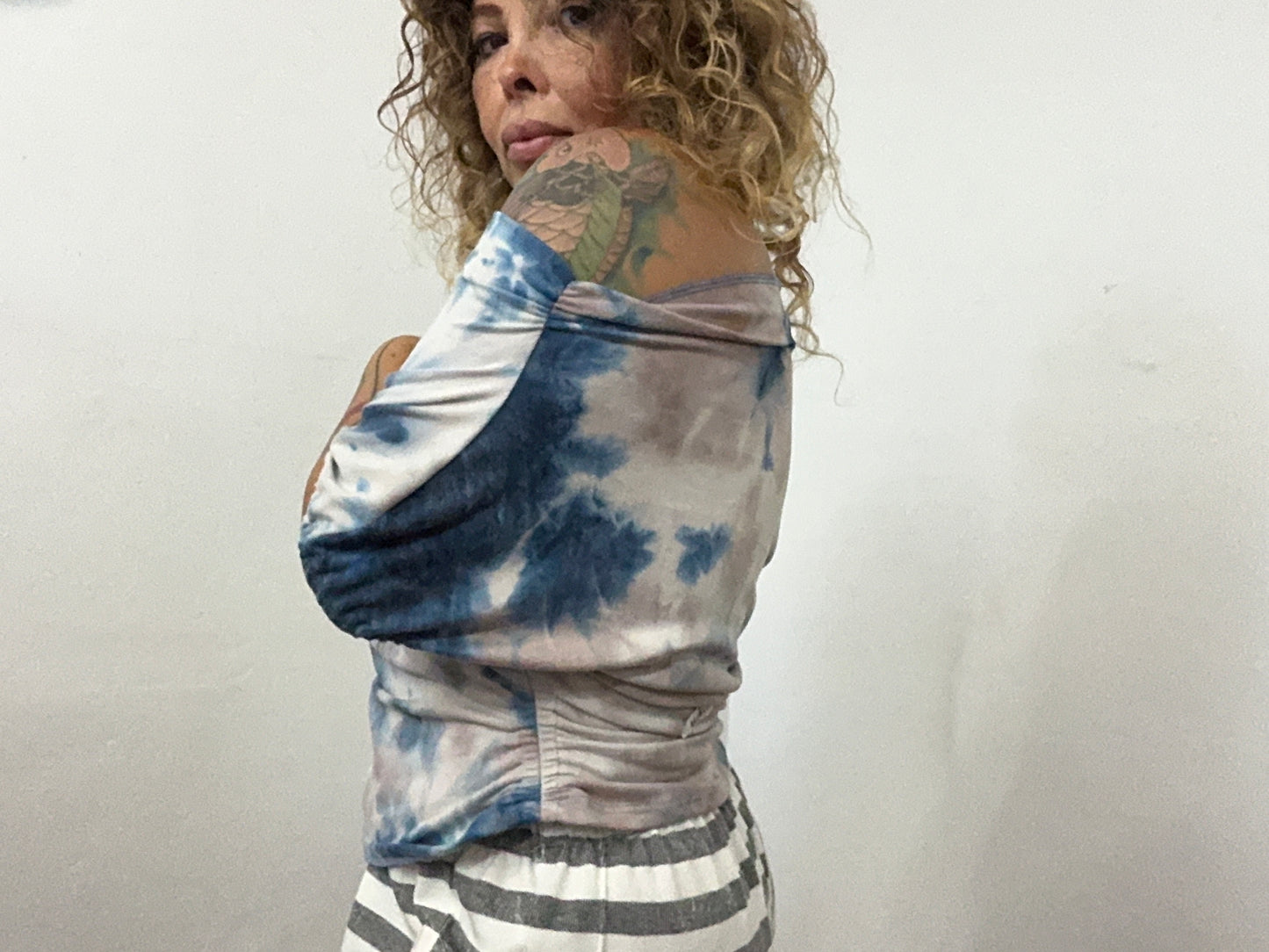 Off shoulder asymmetrical sweater top