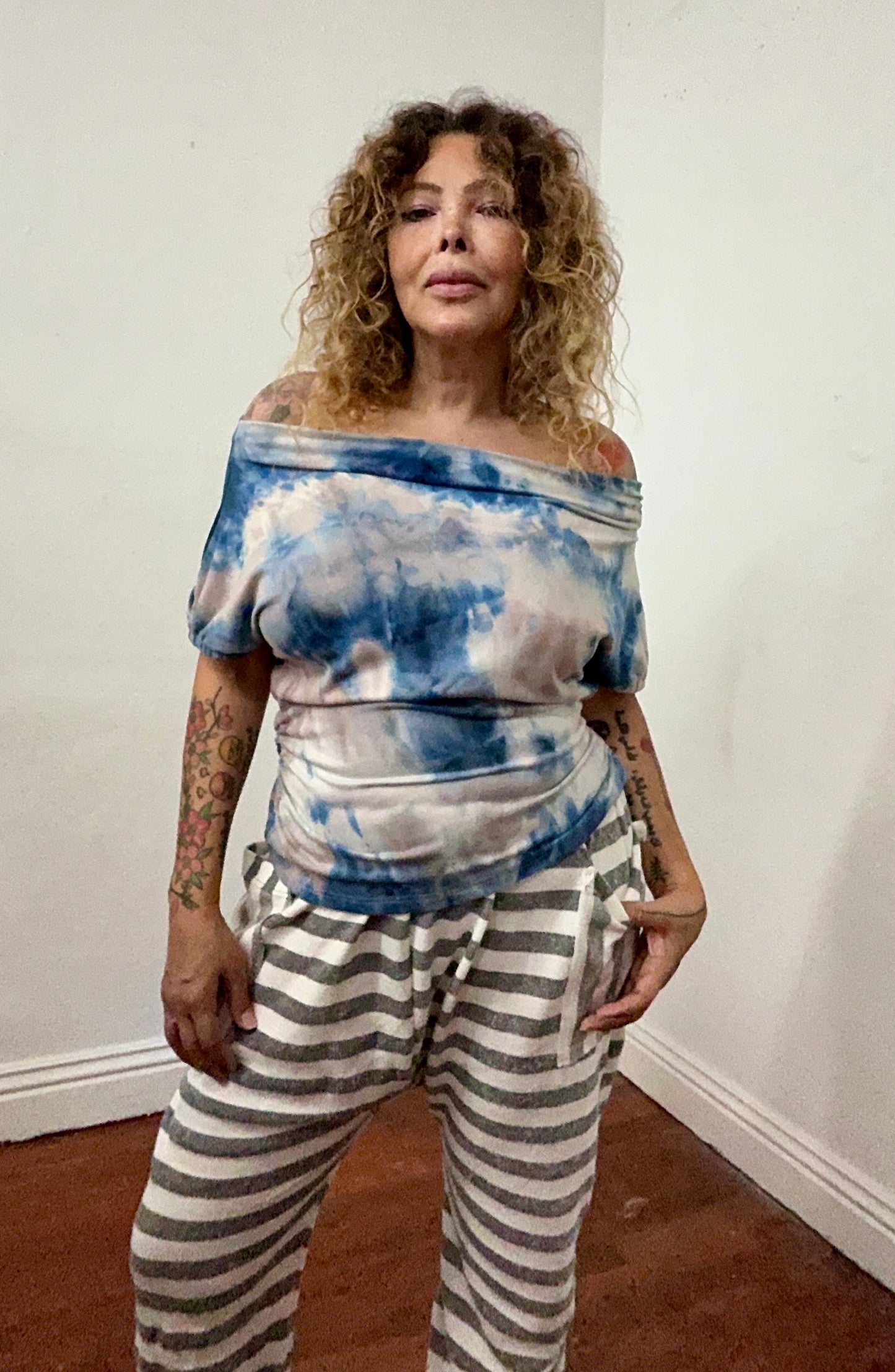 Off shoulder asymmetrical sweater top