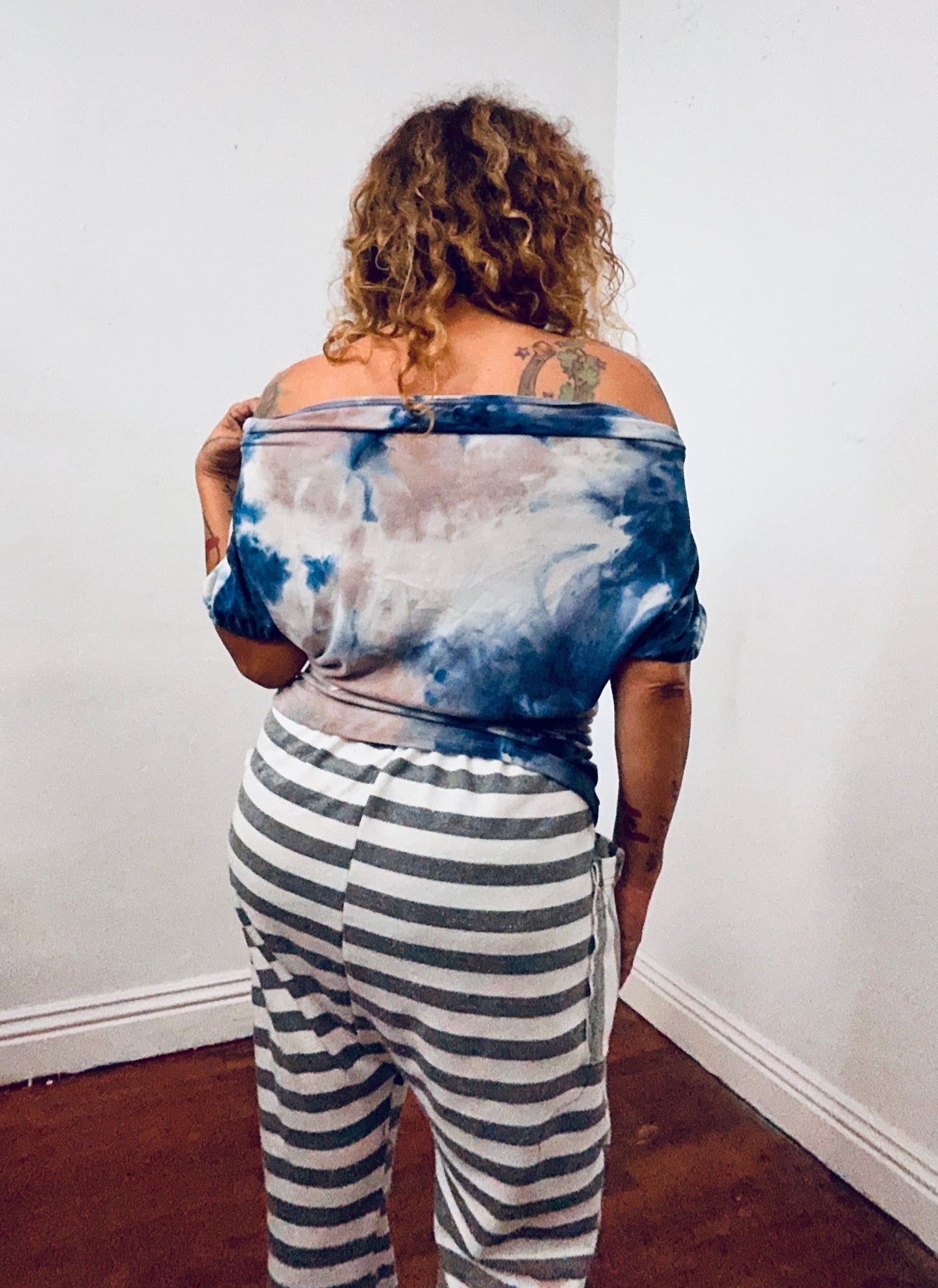 Off shoulder asymmetrical sweater top