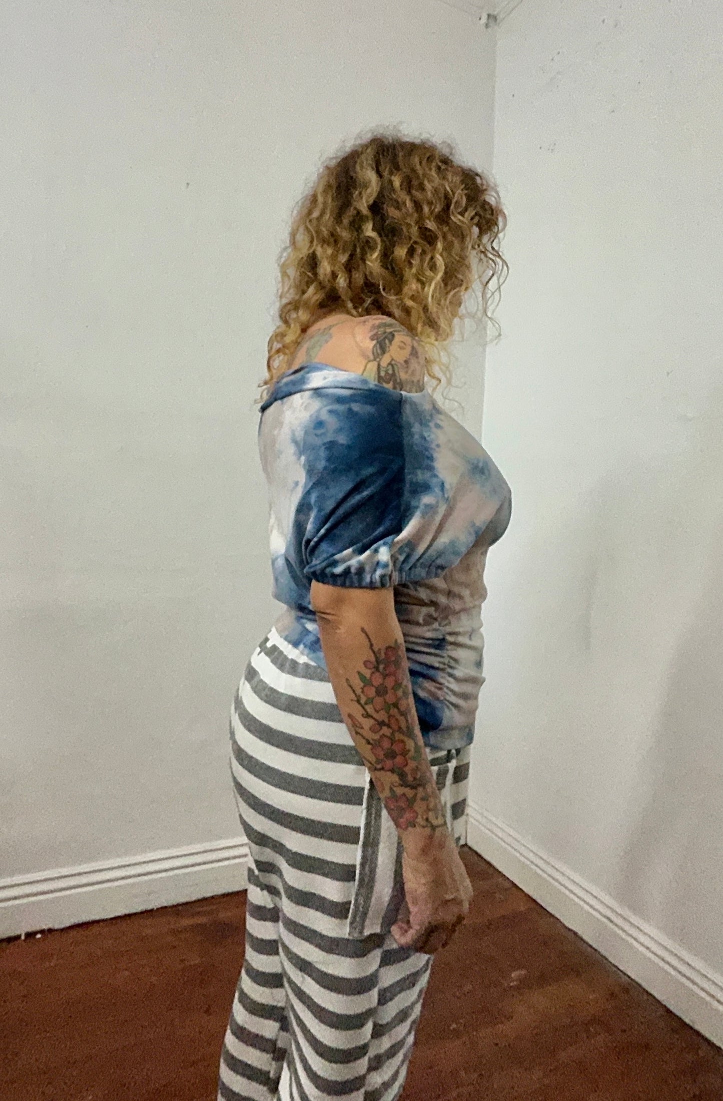 Off shoulder asymmetrical sweater top